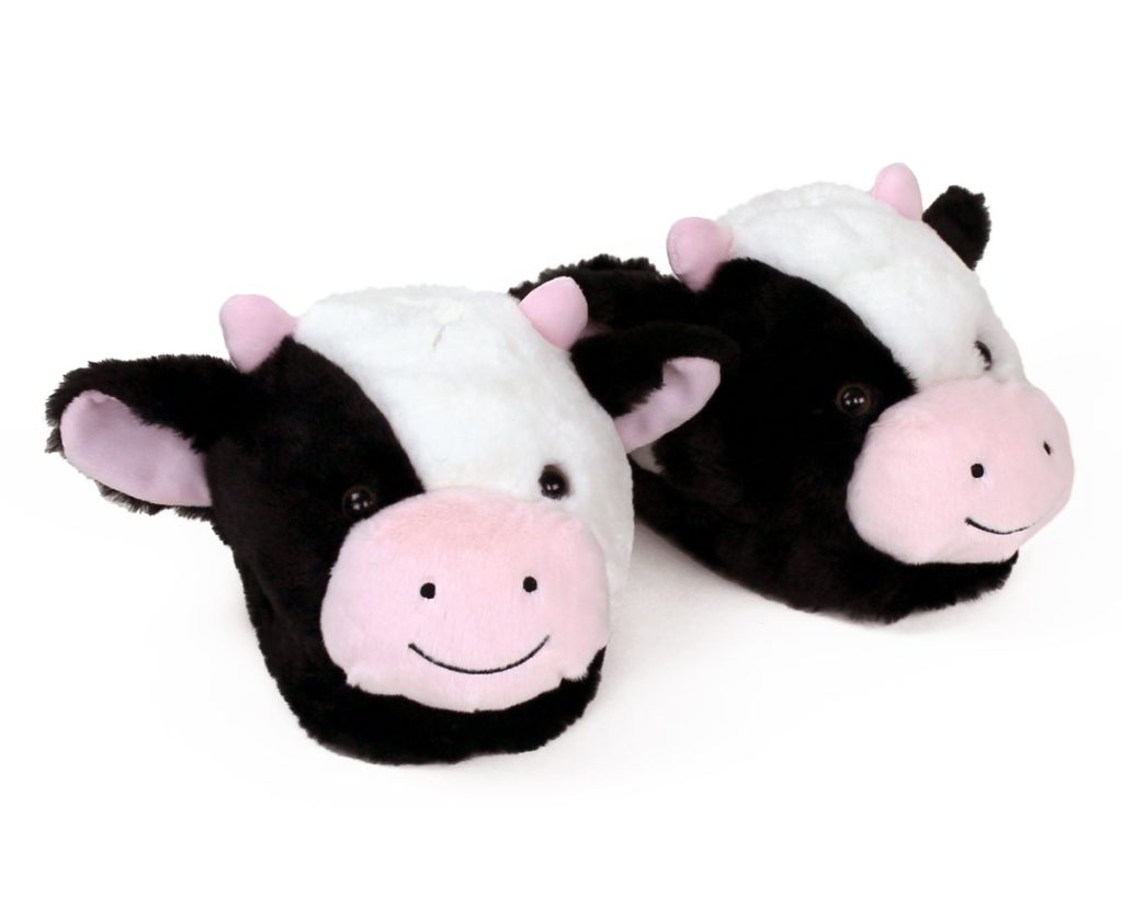 a pair of plush cow slippers
