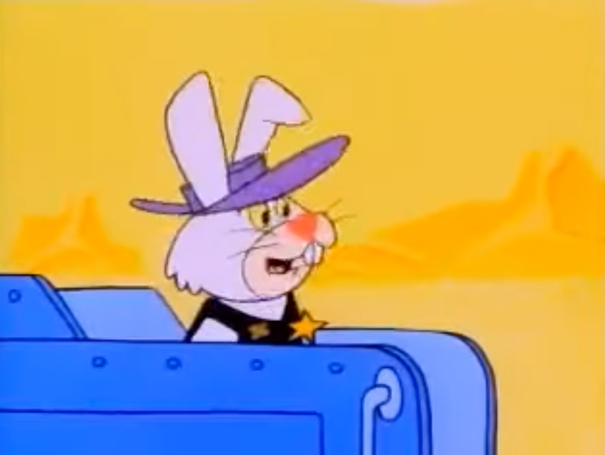 ricochet rabbit sits in a train car