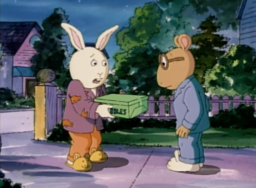 buster holds a box and looks concerned, and talks to arthur who is looking at the box as well