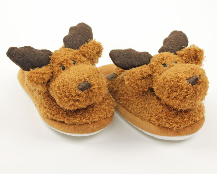 pair of plush slippers for kids that look like two fuzzy moose