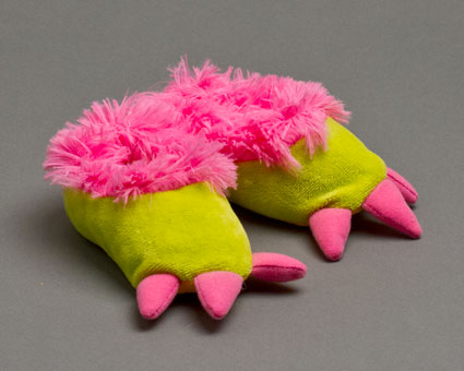 pair of plush slippers for toddlers that look like monster claws